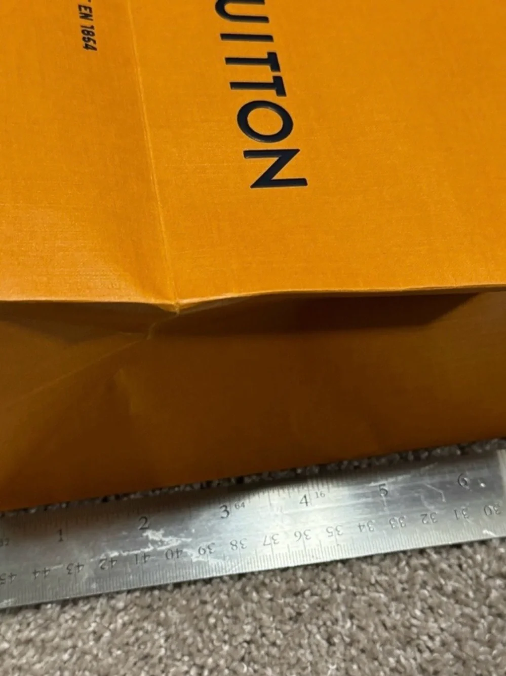 Louis Vuitton Orange Shopping Bag with Blue Handles and Black Logo